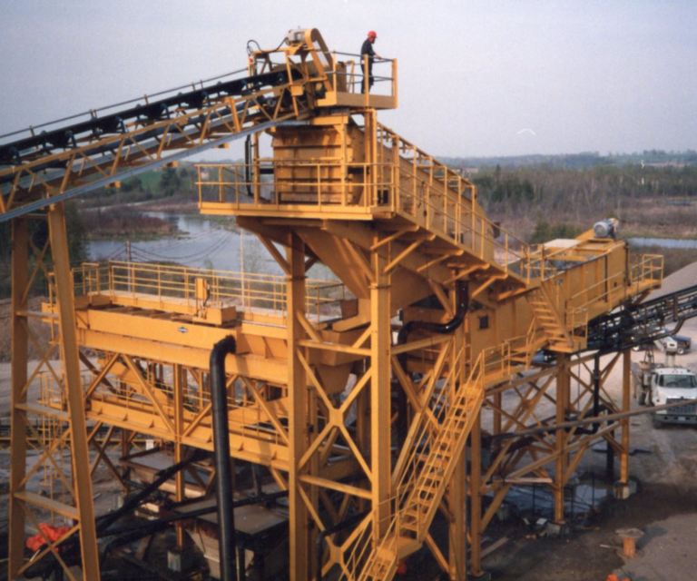 Large scale sorter and stacker moving aggregates to a pile at our legacy Sunderland aggregate pit
